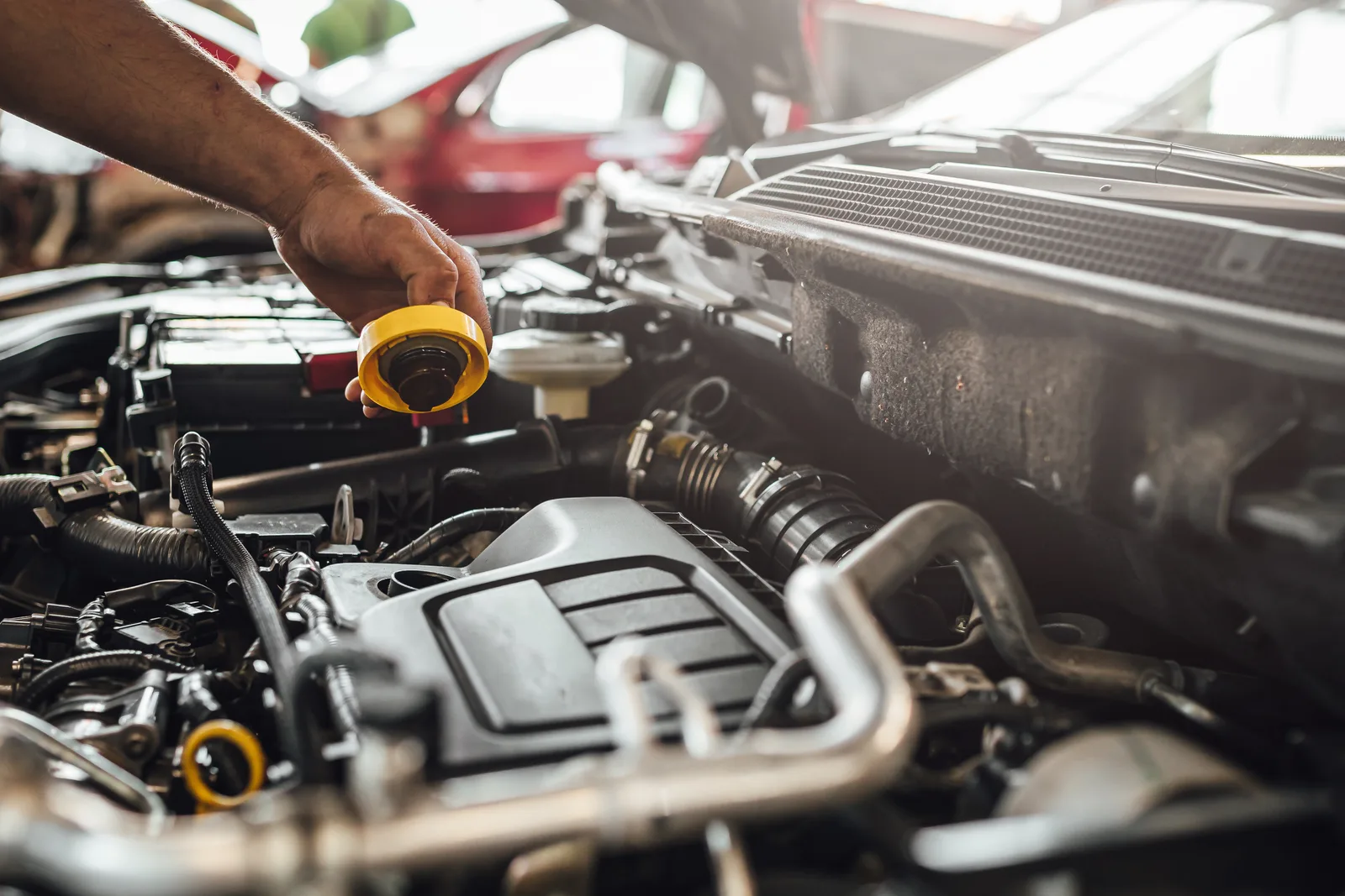 Subaru CVT transmission fluid being checked in a workshop